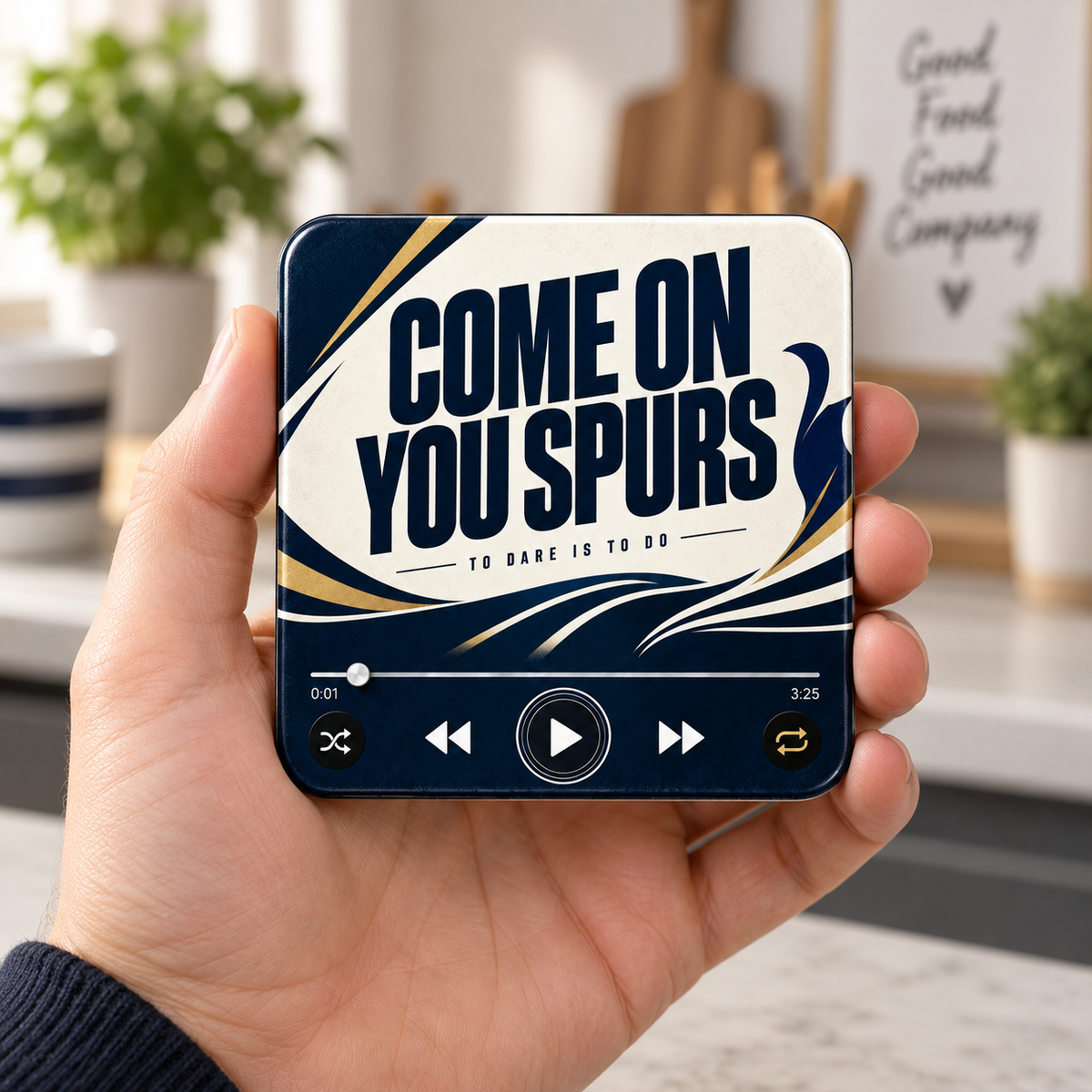 North London White football sound magnet held in hand